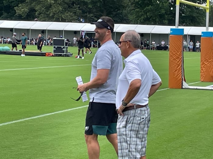 Vic Fangio visits with Nick Sirianni at training camp